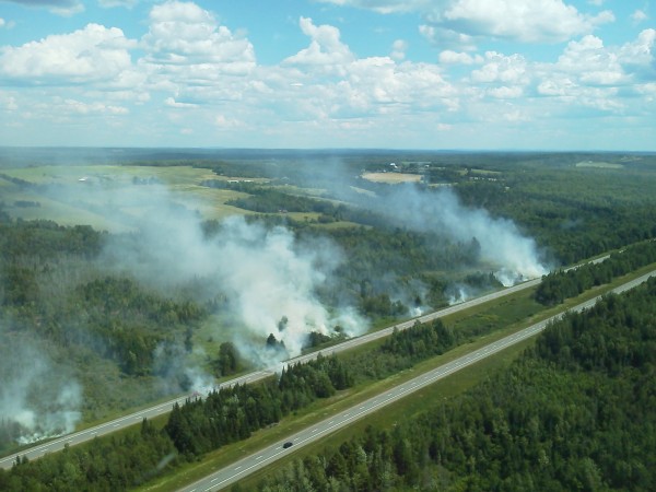 A Maine Forest Service helicopter captured images of a series of 24 to 30 grass fires along Interstate 95's northbound lane from Carmel to Sherman that investigators believe was caused by debris falling from a truck on Tuesday, July 10, 2012. A Maine Forest Service helicopter captured images of a series of 24 to 30 grass fires along Interstate 95's northbound lane from Carmel to Sherman that investigators believe was caused by debris falling from a truck on Tuesday, July 10, 2012.