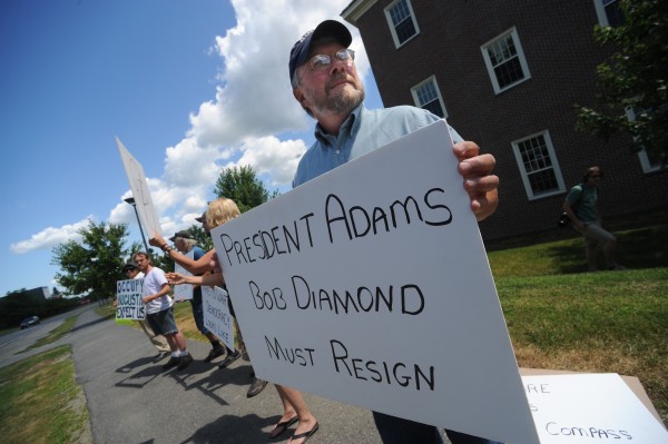 Lew Kingsbury (far right), Colby College Class of 1977, an organic farmer in Pittston, joined members of Occupy Augusta for a demonstration in front of the Diamond Building on Colby's campus Saturday afternoon, July 21, 2012. The group was protesting the fact that the building is named after Robert Edward Diamond Jr. , an American banker and former executive of the British bank Barclay's PLC. Diamond resigned as chief executive of Barclays earlier this month in the wake of a controversy over manipulation of interest rates by traders who worked at the bank. Lew Kingsbury (far right), Colby College Class of 1977, an organic farmer in Pittston, joined members of Occupy Augusta for a demonstration in front of the Diamond Building on Colby's campus Saturday afternoon, July 21, 2012. The group was protesting the fact that the building is named after Robert Edward Diamond Jr. , an American banker and former executive of the British bank Barclay's PLC. Diamond resigned as chief executive of Barclays earlier this month in the wake of a controversy over manipulation of interest rates by traders who worked at the bank.