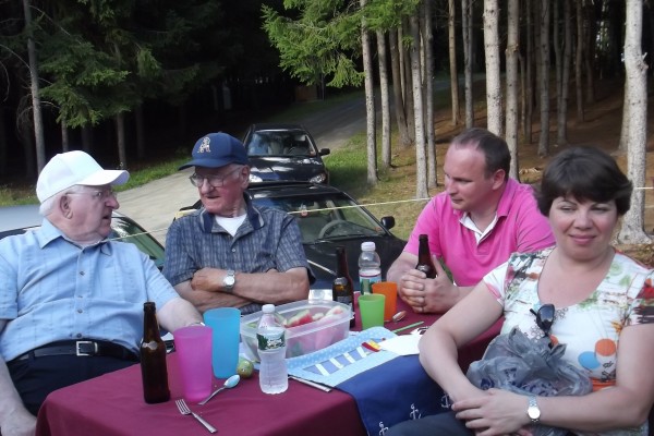Raynald Martin (from left) and Normand Martin, brothers of WWII 2nd Lt. Onias Martin, chat with the caretaker of Onias' monument in Bonnetable, France, Frederic Gaignard and his wife, Veronique, during a party at Normand Martin's home in Bangor on Saturday. The Gaignards and their two daughters are visiting Maine and plan to travel to Madawaska, Onias' hometown, to learn more about the fallen soldier and his family. Gaignard said Onias is revered and honored in Bonnetable, where he was killed by an anti-tank shell in 1944, making him the only Allied casualty of the war in that village. Raynald Martin (from left) and Normand Martin, brothers of WWII 2nd Lt. Onias Martin, chat with the caretaker of Onias' monument in Bonnetable, France, Frederic Gaignard and his wife, Veronique, during a party at Normand Martin's home in Bangor on Saturday. The Gaignards and their two daughters are visiting Maine and plan to travel to Madawaska, Onias' hometown, to learn more about the fallen soldier and his family. Gaignard said Onias is revered and honored in Bonnetable, where he was killed by an anti-tank shell in 1944, making him the only Allied casualty of the war in that village.