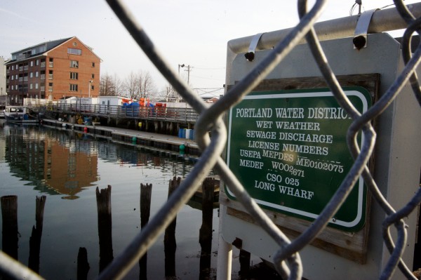 A sign near Long Wharf in Portland marks a wet wether sewage discharge point in March 2012. A sign near Long Wharf in Portland marks a wet wether sewage discharge point in March 2012.