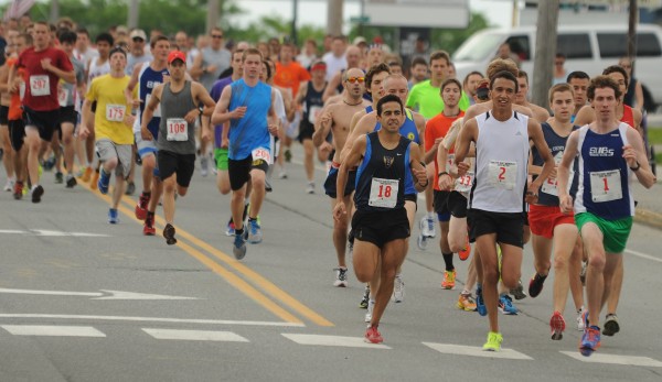 Runners take to Wilson Street in Brewer for the start of the 2012 Walter Hunt 3K on Wednesday,. Runners take to Wilson Street in Brewer for the start of the 2012 Walter Hunt 3K on Wednesday,.