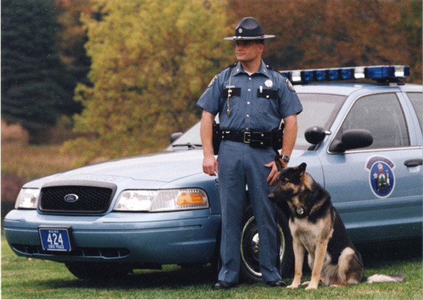 The well-loved Maine State Police K-9 Ruger, pictured with Maine State Trooper Stephen Hills, recently died. The well-loved Maine State Police K-9 Ruger, pictured with Maine State Trooper Stephen Hills, recently died.