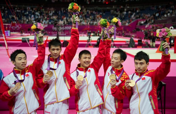 The men's gymnastics team from China celebrated their gold medal victory in team finals at North Greenwich Arena during the 2012 Summer Olympic Games in London, England, Monday, July 30, 2012.
The men's gymnastics team from China celebrated their gold medal victory in team finals at North Greenwich Arena during the 2012 Summer Olympic Games in London, England, Monday, July 30, 2012.
