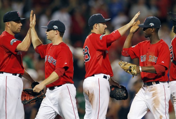 Boston Red Sox players, from left, Alfredo Aceves, Daniel Nava, Adrian Gonzalez and Pedro Ciriaco celebrate after defeating the New York Yankees 9-5 in the second baseball game of a doubleheader in Boston, Saturday, July 7, 2012. Boston Red Sox players, from left, Alfredo Aceves, Daniel Nava, Adrian Gonzalez and Pedro Ciriaco celebrate after defeating the New York Yankees 9-5 in the second baseball game of a doubleheader in Boston, Saturday, July 7, 2012.
