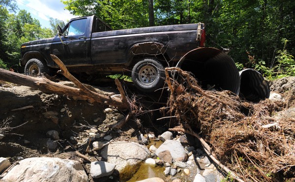 A driveway was washed away from under a pickup that was parked over the culvert along Stickney Hill Road in Brownville. The repair work after the recent flooding has created a huge financial burden for the town of Brownville. Town Manager Matthew Pineo is asking Gov. LePage to release funds to help the town in the wake of the severe flooding. A driveway was washed away from under a pickup that was parked over the culvert along Stickney Hill Road in Brownville. The repair work after the recent flooding has created a huge financial burden for the town of Brownville. Town Manager Matthew Pineo is asking Gov. LePage to release funds to help the town in the wake of the severe flooding.