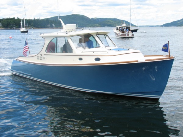 Hinckley Yachts launched its first model of the new T34 on Monday, July 2, 2012, from its service facility in the Southwest Harbor village of Manset on Mount Desert Island. The picnic-style boat is the second type of power yacht the firm has launched this year. Hinckley Yachts launched its first model of the new T34 on Monday, July 2, 2012, from its service facility in the Southwest Harbor village of Manset on Mount Desert Island. The picnic-style boat is the second type of power yacht the firm has launched this year.