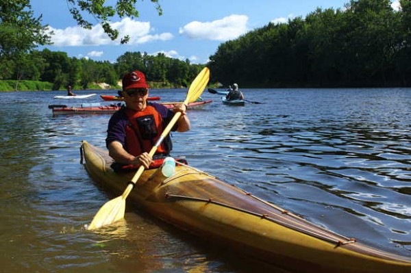 Perry Risley of Bethel kayaks down the Androscoggin River on Thursday during the Androscoggin Source to the Sea Trek. Perry Risley of Bethel kayaks down the Androscoggin River on Thursday during the Androscoggin Source to the Sea Trek.