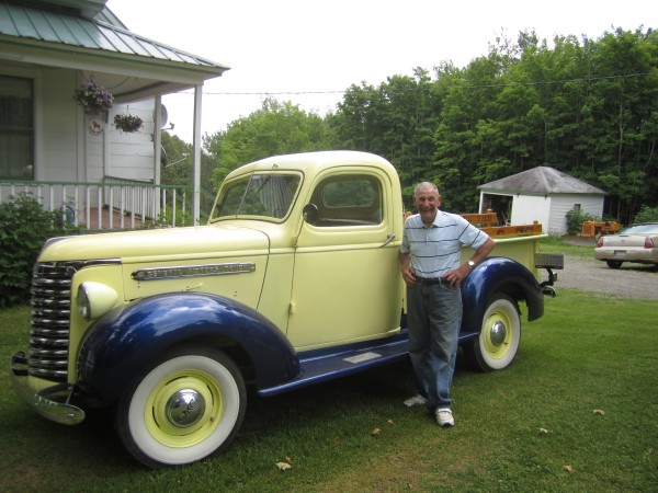 Ralph Ostlund stands outside his New Sweden home with a restored 1939 truck, a gift from his son. Ralph Ostlund stands outside his New Sweden home with a restored 1939 truck, a gift from his son.