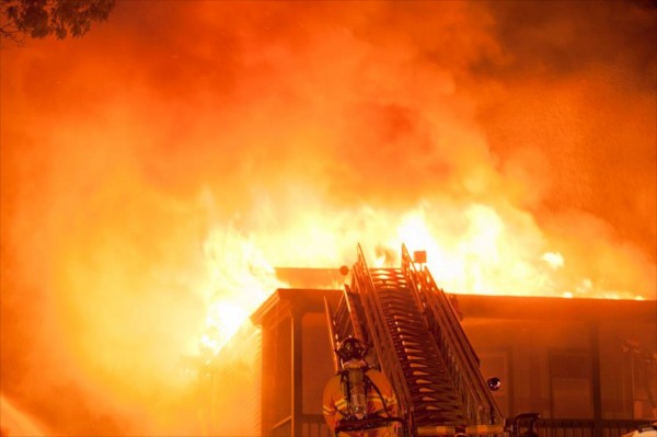 Firefighters battle an early morning fire Wednesday, Aug. 15, 2012 at 554 Main Street in South Portland. Firefighters battle an early morning fire Wednesday, Aug. 15, 2012 at 554 Main Street in South Portland.