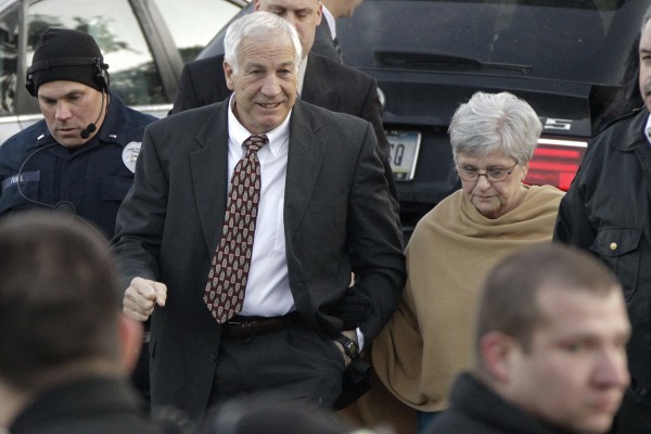 Former Penn State assistant football coach Jerry Sandusky arrives with his wife, Dottie Sandusky, for a preliminary hearing at the Centre County Courthouse in Bellefonte, Pa., in December 2011. Former Penn State assistant football coach Jerry Sandusky arrives with his wife, Dottie Sandusky, for a preliminary hearing at the Centre County Courthouse in Bellefonte, Pa., in December 2011.