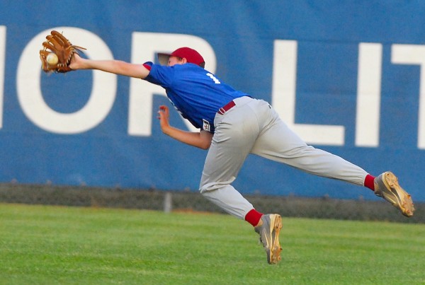 Bangor right fielder Andrew Hillier makes a diving catch in the sixth inning of play against Holbrook of Holden at Mansfield Stadium in Bangor on Wednesday, Aug. 8, 2012. Bangor right fielder Andrew Hillier makes a diving catch in the sixth inning of play against Holbrook of Holden at Mansfield Stadium in Bangor on Wednesday, Aug. 8, 2012.