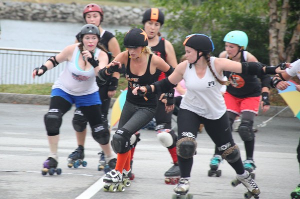 Competition is fierce in Bangor Roller Derby's first exhibition bout, held last Saturday, Aug. 11 at the KahBang Festival in Bangor. Competition is fierce in Bangor Roller Derby's first exhibition bout, held last Saturday, Aug. 11 at the KahBang Festival in Bangor.