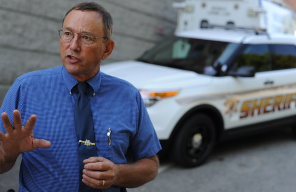 Penobscot County Sheriff Glenn Ross stands in front of two of the department's newly acquired Ford SUVs Monday, Aug. 27, 2012. The Penobscot County Sheriff's Office is transitioning from Ford Crown Victoria cruisers to the SUVs. One reason for the change is the need for extra space to accommodate the large amount of equipment they must have with them. Penobscot County Sheriff Glenn Ross stands in front of two of the department's newly acquired Ford SUVs Monday, Aug. 27, 2012. The Penobscot County Sheriff's Office is transitioning from Ford Crown Victoria cruisers to the SUVs. One reason for the change is the need for extra space to accommodate the large amount of equipment they must have with them.