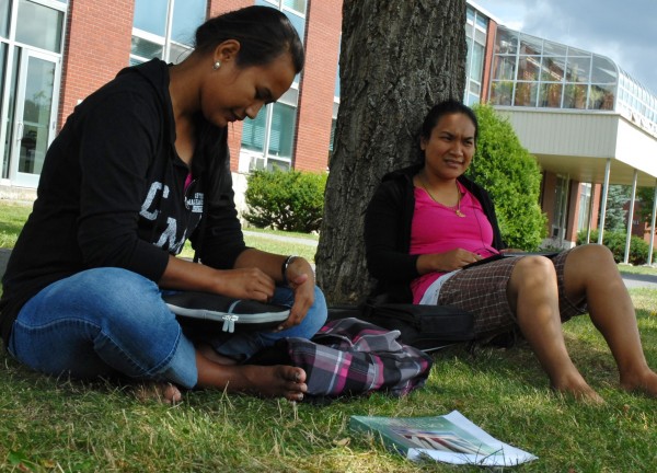 Annshirly Boon (left) and Stacy Anmontha spend a few moments relaxing before resuming their classwork at the University of Maine at Fort Kent on Sunday, Aug. 5, 2012. Annshirly Boon (left) and Stacy Anmontha spend a few moments relaxing before resuming their classwork at the University of Maine at Fort Kent on Sunday, Aug. 5, 2012.