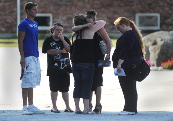 Family and friends console one another outside Bangor Baptist Church after Sunday afternoon's memorial service for Nicolle Lugdon. Family and friends console one another outside Bangor Baptist Church after Sunday afternoon's memorial service for Nicolle Lugdon.