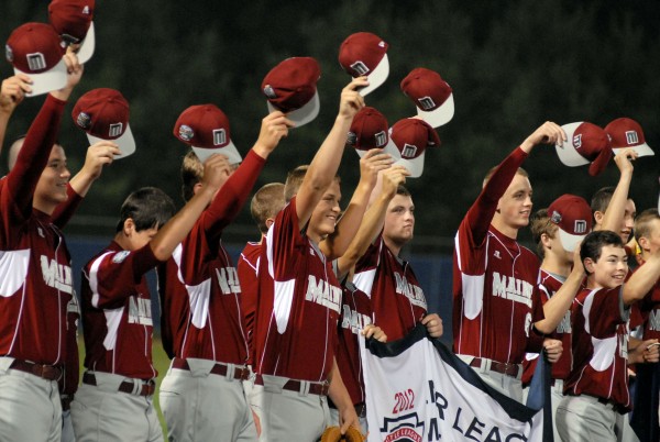 The Maine District 3 baseball team acknowledges a cheering crowd during the opening ceremony the 2012 Senior League World Series at Mansfield Stadium Saturday night. The Maine District 3 baseball team acknowledges a cheering crowd during the opening ceremony the 2012 Senior League World Series at Mansfield Stadium Saturday night.