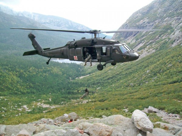 The crew of a Maine Army National Guard rescue Black Hawk helicopter lifts an injured hiker off a trail at the request of Baxter State Park officials in this undated photo. The Black Hawk's flight crew that day included Lt. Col. Mark Sullivan, Chief Warrant Officer 4 Jon Campbell, Staff Sgt. Mark Urquhart and Sgt. Carson Kelley. The crew of a Maine Army National Guard rescue Black Hawk helicopter lifts an injured hiker off a trail at the request of Baxter State Park officials in this undated photo. The Black Hawk's flight crew that day included Lt. Col. Mark Sullivan, Chief Warrant Officer 4 Jon Campbell, Staff Sgt. Mark Urquhart and Sgt. Carson Kelley.