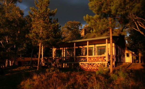 Late afternoon sunlight brightens the exterior of a cabin at Libby Camps in Ashland. Late afternoon sunlight brightens the exterior of a cabin at Libby Camps in Ashland.