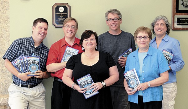 Contributors to the local anthology "A Quiet Blue Wheel" pose with copies of their book. From left: David M. Fitzpatrick, class instructor and editor; Christopher Olsen; Kelly Jean Richardson; Greg Westrich; Anette Ruppel Rodrigues; and Paula Burnett. Not pictured: Charles O'Leary, Marsha Libby, and Amanda and Josh Updegraff. Contributors to the local anthology "A Quiet Blue Wheel" pose with copies of their book. From left: David M. Fitzpatrick, class instructor and editor; Christopher Olsen; Kelly Jean Richardson; Greg Westrich; Anette Ruppel Rodrigues; and Paula Burnett. Not pictured: Charles O'Leary, Marsha Libby, and Amanda and Josh Updegraff.