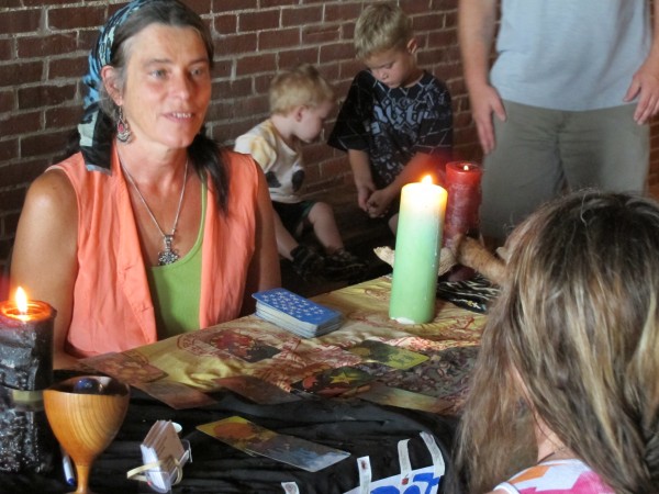 Rebecca Albright of Otis reads tarot cards during the Psychic and Paranormal Faire at Fort Knox in Prospect on Sunday, Aug. 12, 2012. Rebecca Albright of Otis reads tarot cards during the Psychic and Paranormal Faire at Fort Knox in Prospect on Sunday, Aug. 12, 2012.