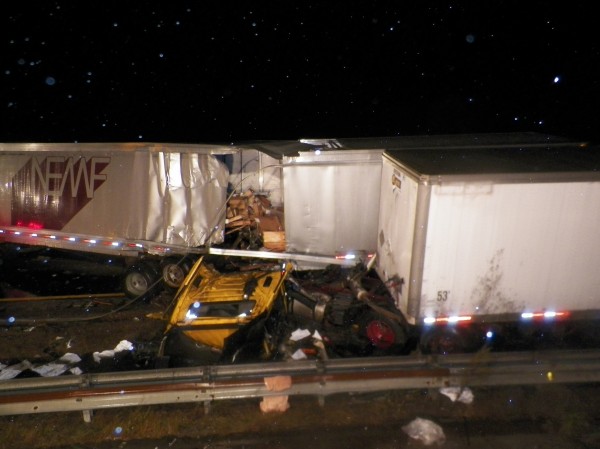 Two tractor-trailers crashed on the Maine Turnpike in Saco around 9:30 p.m. Friday, Sept. 28, 2012. Two tractor-trailers crashed on the Maine Turnpike in Saco around 9:30 p.m. Friday, Sept. 28, 2012.