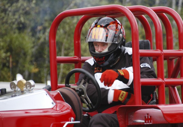 Robert Pryor, a tractor driver from Centerville, New Brunswick, belts himself in before racing in the Northern Timber Cruisers Truck Pull at Millinocket Regional Airport in 2010. Robert Pryor, a tractor driver from Centerville, New Brunswick, belts himself in before racing in the Northern Timber Cruisers Truck Pull at Millinocket Regional Airport in 2010.