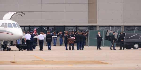 Staff Sgt. Jessica Wing's casket is carried from an airplane to a waiting hearse in Bangor on Friday. Wing's death in Kuwait was non-combat-related. She was a helicopter crew chief assigned to the 1st Battalion, 126th Air Medevac Company out of Bangor. Staff Sgt. Jessica Wing's casket is carried from an airplane to a waiting hearse in Bangor on Friday. Wing's death in Kuwait was non-combat-related. She was a helicopter crew chief assigned to the 1st Battalion, 126th Air Medevac Company out of Bangor.