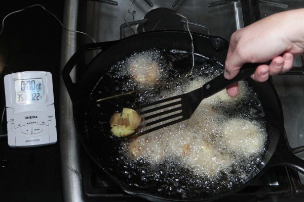 When making smashed fried potatoes, the third step is to pan-fry them in a shallow layer of oil just until the outer layer is richly golden. When making smashed fried potatoes, the third step is to pan-fry them in a shallow layer of oil just until the outer layer is richly golden.