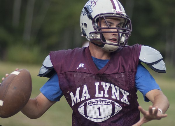 Mattanawcook Academy quarterback Trysten Pelkey throws a pass during a recent practice. Pelkey will try to lead the Lynx to a playoff berth this season. Mattanawcook Academy quarterback Trysten Pelkey throws a pass during a recent practice. Pelkey will try to lead the Lynx to a playoff berth this season.