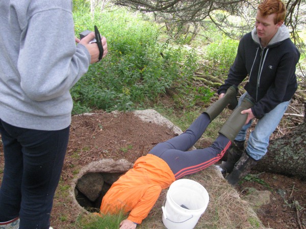 Natalie Murphy, 16, of Islesboro, measures the recharge rate of fresh water in a well on Hurricane Island while Ian Davis, 15, also of Islesboro, keeps a firm hold on her rainboots. The Islesboro Central School classmates spent three days doing a water systems science research project with the Hurricane Island Center for Science and Leadership. Natalie Murphy, 16, of Islesboro, measures the recharge rate of fresh water in a well on Hurricane Island while Ian Davis, 15, also of Islesboro, keeps a firm hold on her rainboots. The Islesboro Central School classmates spent three days doing a water systems science research project with the Hurricane Island Center for Science and Leadership.