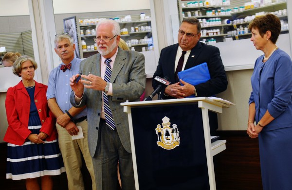 Karl Schumann of Becton, Dickinson and Company demonstrates one of the 3,000 needle clipping devices his company donated to the Maine Department of Environmental Protection for a new safe medical sharps disposal campaign on Sept. 7, 2012, at a Rite Aid Pharmacy in Augusta. From left are Rep. Jane Knapp and Sen. Tom Saviello of the Legislatures Environment and Natural Resources Committee, Gov. Paul LePage, and Maine DEP Commissioner Patricia Aho. Karl Schumann of Becton, Dickinson and Company demonstrates one of the 3,000 needle clipping devices his company donated to the Maine Department of Environmental Protection for a new safe medical sharps disposal campaign on Sept. 7, 2012, at a Rite Aid Pharmacy in Augusta. From left are Rep. Jane Knapp and Sen. Tom Saviello of the Legislatures Environment and Natural Resources Committee, Gov. Paul LePage, and Maine DEP Commissioner Patricia Aho.