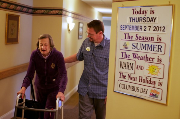 Peter Henckel, program coordinator with Cape Memory Care in Cape Elizabeth, walks and jokes with resident Dorothy Green on Thursday, Sept. 27, 2012. Peter Henckel, program coordinator with Cape Memory Care in Cape Elizabeth, walks and jokes with resident Dorothy Green on Thursday, Sept. 27, 2012.