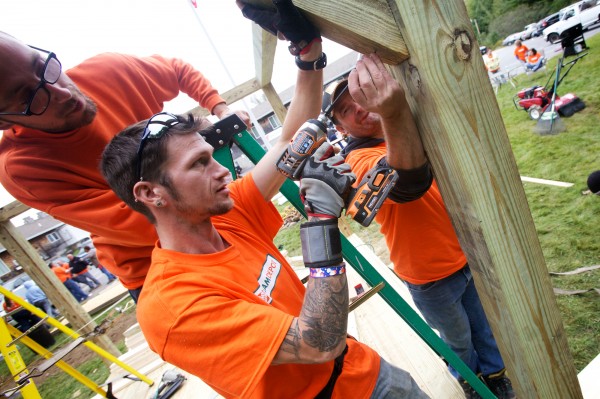 Maine Home Depot workers Brian Johnsen (left), Jake Grant (center) and Ken Cox volunteer their time Friday, Sept. 21, 2012 building a screened gazebo at the Arthur B. Huot Veterans Housing complex in Saco. Over 100 volunteers from Home Depot stores from Ellsworth to Biddeford took part building and painting at the complex as well as at the Veterans Career House in Biddeford. Maine Home Depot workers Brian Johnsen (left), Jake Grant (center) and Ken Cox volunteer their time Friday, Sept. 21, 2012 building a screened gazebo at the Arthur B. Huot Veterans Housing complex in Saco. Over 100 volunteers from Home Depot stores from Ellsworth to Biddeford took part building and painting at the complex as well as at the Veterans Career House in Biddeford.