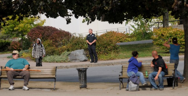 Bangor Police Officer John Robinson takes a minute to look around Pickering Square while on a downtown foot patrol Tuesday afternoon, Sept. 18, 2012. Responding to complaints of disorderly behavior, the city has expanded downtown foot patrols. Bangor Police Sergeant Paul Edwards said officers are able to keep a close eye on a several-block area effectively. Bangor Police Officer John Robinson takes a minute to look around Pickering Square while on a downtown foot patrol Tuesday afternoon, Sept. 18, 2012. Responding to complaints of disorderly behavior, the city has expanded downtown foot patrols. Bangor Police Sergeant Paul Edwards said officers are able to keep a close eye on a several-block area effectively.