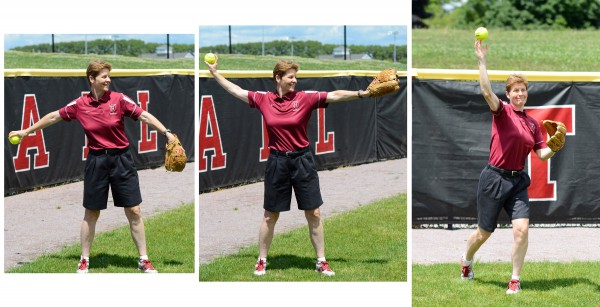 Harvard softball coach Jenny Allard demonstrates proper technique for throwing overhand; here she begins her throw. Harvard softball coach Jenny Allard demonstrates proper technique for throwing overhand; here she begins her throw.