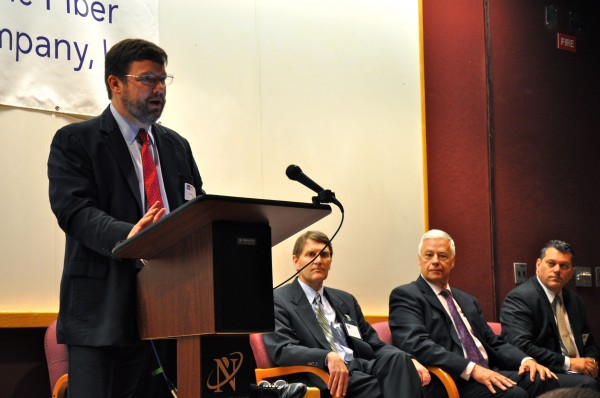 Fletcher Kittredge, CEO of Biddeford-based GWI, speaks at an event in Brunswick celebrating the completion of the Three Ring Binder project, which he was instrumental in launching. In the background are, from the left, Dwight Allison, CEO of Maine Fiber Co.; U.S. Rep. Mike Michaud; and George Gervais, commissioner of the Department of Economic and Community Development. Fletcher Kittredge, CEO of Biddeford-based GWI, speaks at an event in Brunswick celebrating the completion of the Three Ring Binder project, which he was instrumental in launching. In the background are, from the left, Dwight Allison, CEO of Maine Fiber Co.; U.S. Rep. Mike Michaud; and George Gervais, commissioner of the Department of Economic and Community Development.
