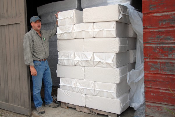 Haskell Lumber Inc. and LMJ Enterprises LLC co-owner Mike McFalls with some packaged inventory at his Lincoln business on Friday, Sept. 28, 2012. McFalls has transitioned his Lincoln hardware store from a sawmill to a wood-shavings mill. Haskell Lumber Inc. and LMJ Enterprises LLC co-owner Mike McFalls with some packaged inventory at his Lincoln business on Friday, Sept. 28, 2012. McFalls has transitioned his Lincoln hardware store from a sawmill to a wood-shavings mill.