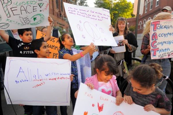 Children hold signs promoting peace at a demonstration in Belfast on Monday afternoon. About 60 people participated in the demonstration against the Middle East violence sparked by an anti-Islamic video. Children hold signs promoting peace at a demonstration in Belfast on Monday afternoon. About 60 people participated in the demonstration against the Middle East violence sparked by an anti-Islamic video.