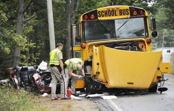 Oxford County Sheriff's Department officers investigate the scene of an accident on Route 119 in Hebron involving an Oxford Hills school bus and an Audi automobile on Tuesday afternoon, Sept. 18, 2012. Emergency workers used the Jaws of Life to remove the roof the car to extricate the driver, 19-year-old Brandon Buffington of Paris. Oxford County Sheriff's Department officers investigate the scene of an accident on Route 119 in Hebron involving an Oxford Hills school bus and an Audi automobile on Tuesday afternoon, Sept. 18, 2012. Emergency workers used the Jaws of Life to remove the roof the car to extricate the driver, 19-year-old Brandon Buffington of Paris.