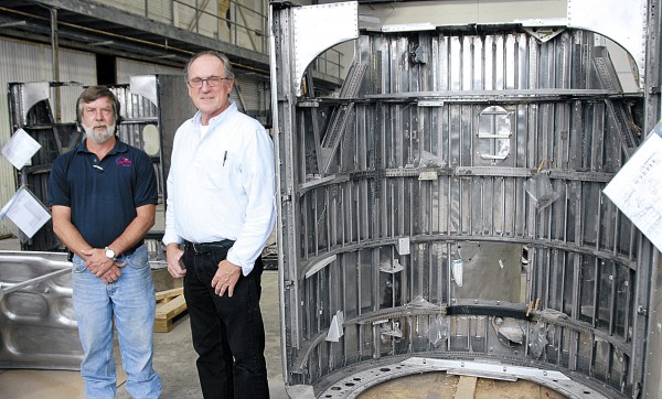 After starting to restore a Lockheed Constellation L-1649A at the Lewiston-Auburn Airport, a Lufthansa subsidiary hired Maine Aero Services of Bangor to repair parts that will be used on the vintage prop-driven airliner. Standing next to an engine nacelle for the Constellation at the MAS hangar at Bangor International Airport are MAS President and CEO Gene Richardson (right) and General Manager Ray Lane (left). After starting to restore a Lockheed Constellation L-1649A at the Lewiston-Auburn Airport, a Lufthansa subsidiary hired Maine Aero Services of Bangor to repair parts that will be used on the vintage prop-driven airliner. Standing next to an engine nacelle for the Constellation at the MAS hangar at Bangor International Airport are MAS President and CEO Gene Richardson (right) and General Manager Ray Lane (left).