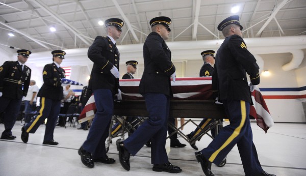 Staff Sgt. Jessica Wing's casket is taken from the Augusta Armory after funeral services Saturday afternoon. Staff Sgt. Jessica Wing's casket is taken from the Augusta Armory after funeral services Saturday afternoon.