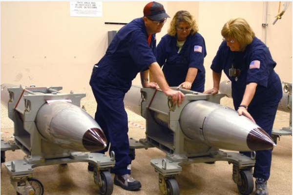 Technicians at the Pantex Plant in Texas, where nuclear bombs are disassembled for testing, prepare to start the evaluation process on a B61 nuclear bomb, the oldest in the arsenal. The B61 is about to undergo a major overhaul that the Pentagon estimates will cost up to $10 billion, or $25 million per bomb.
Technicians at the Pantex Plant in Texas, where nuclear bombs are disassembled for testing, prepare to start the evaluation process on a B61 nuclear bomb, the oldest in the arsenal. The B61 is about to undergo a major overhaul that the Pentagon estimates will cost up to $10 billion, or $25 million per bomb.