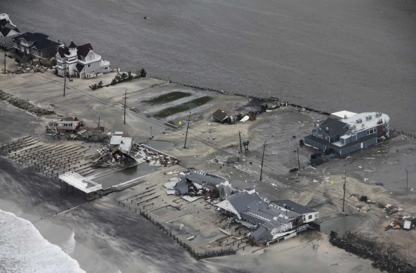 Damage after Hurricane Sandy made landfall on the southern New Jersey coastline is seen in this U.S. Coast Guard handout photo in Brigantine, New Jersey, Oct. 30, 2012. In the storm's wake, Obama issued federal emergency decrees for New York and New Jersey, declaring that "major disasters" existed in both states. One disaster-forecasting company predicted economic losses could ultimately reach $20 billion, only half insured. Damage after Hurricane Sandy made landfall on the southern New Jersey coastline is seen in this U.S. Coast Guard handout photo in Brigantine, New Jersey, Oct. 30, 2012. In the storm's wake, Obama issued federal emergency decrees for New York and New Jersey, declaring that "major disasters" existed in both states. One disaster-forecasting company predicted economic losses could ultimately reach $20 billion, only half insured.