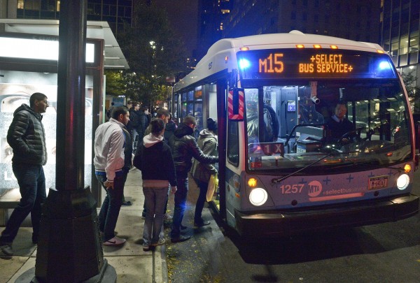 This photo provided by Metropolitan Transportation Authority shows people boarding a bus, as partial bus service was restored on Tuesday, Oct. 30, 2012. Mass transit, including buses, was suspended during Sandy, the storm that made landfall Monday. This photo provided by Metropolitan Transportation Authority shows people boarding a bus, as partial bus service was restored on Tuesday, Oct. 30, 2012. Mass transit, including buses, was suspended during Sandy, the storm that made landfall Monday.