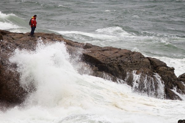 A man watches the surf at Fort Williams Park in Cape Elizabeth on Monday, Oct. 29, 2012 as Hurricane Sandy's weather came ashore. A man watches the surf at Fort Williams Park in Cape Elizabeth on Monday, Oct. 29, 2012 as Hurricane Sandy's weather came ashore.
