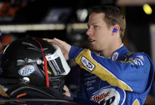 In this Sept. 28, 2012, file photo, Driver Brad Keselowski prepares his helmet before practice for the NASCAR Sprint Cup Series auto race in Dover, Del. There's debate over where a driver wants to be in the championship standings at this point of the Chase for the Sprint Cup. Keselowski is quite comfortable in the lead. In this Sept. 28, 2012, file photo, Driver Brad Keselowski prepares his helmet before practice for the NASCAR Sprint Cup Series auto race in Dover, Del. There's debate over where a driver wants to be in the championship standings at this point of the Chase for the Sprint Cup. Keselowski is quite comfortable in the lead.