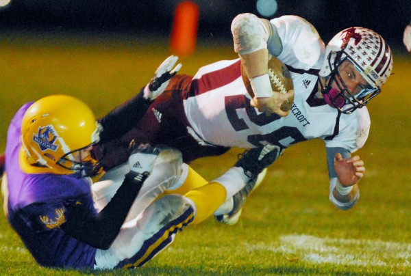 Bucksport's Jack Cyr (left) takes down Foxcroft's Don Boyer (26) during third-quarter action at Bucksport, Friday, Oct. 12, 2012. Bucksport won 13-0. Bucksport's Jack Cyr (left) takes down Foxcroft's Don Boyer (26) during third-quarter action at Bucksport, Friday, Oct. 12, 2012. Bucksport won 13-0.