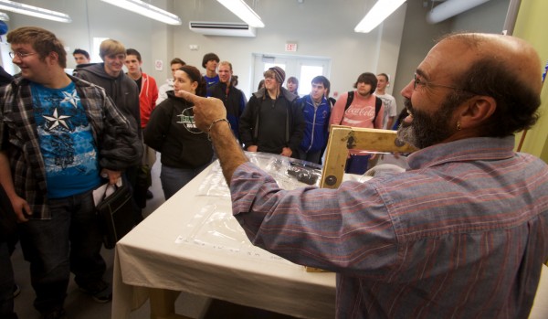 Southern Maine Community College composites professor Andrew Schoenberg explains simple vacuum thermo-forming to Mt. Ararat High School students at the Brunswick campus Wednesday Oct. 17, 2012 during its first STEM conference. Southern Maine Community College composites professor Andrew Schoenberg explains simple vacuum thermo-forming to Mt. Ararat High School students at the Brunswick campus Wednesday Oct. 17, 2012 during its first STEM conference.