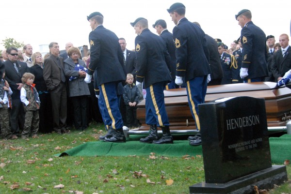 An honor guard departs from the coffin of Sgt. 1st Class Aaron Henderson during graveside services in Houlton on Wednesday, Oct. 10, 2012. Henderson, who grew up in Hodgdon, died at Bagram Air Force Base in Afghanistan on Oct. 2 from wounds suffered in an improvised explosives device attack on Sept. 30, 2012 in Helmand Province, Afghanistan. An honor guard departs from the coffin of Sgt. 1st Class Aaron Henderson during graveside services in Houlton on Wednesday, Oct. 10, 2012. Henderson, who grew up in Hodgdon, died at Bagram Air Force Base in Afghanistan on Oct. 2 from wounds suffered in an improvised explosives device attack on Sept. 30, 2012 in Helmand Province, Afghanistan.