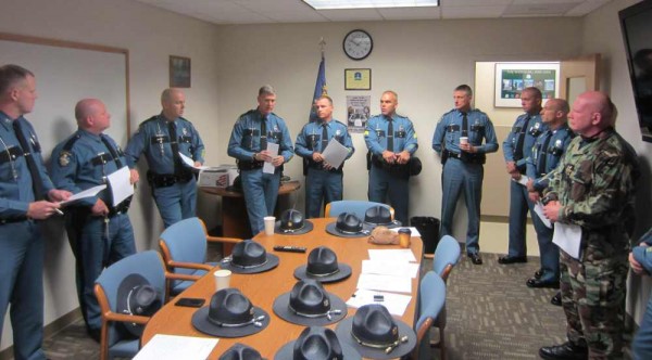 Colonel Williams (fourth from left) addresses a the group of Maine State Police troopers and Cumberland County Sheriffs Department deputies who were heading to New Jersey on Sunday morning, Nov. 4, 2012 to assist in the aftermath of Hurricane Sandy, which wreaked havoc on the region when it made landfall a week ago. Colonel Williams (fourth from left) addresses a the group of Maine State Police troopers and Cumberland County Sheriffs Department deputies who were heading to New Jersey on Sunday morning, Nov. 4, 2012 to assist in the aftermath of Hurricane Sandy, which wreaked havoc on the region when it made landfall a week ago.